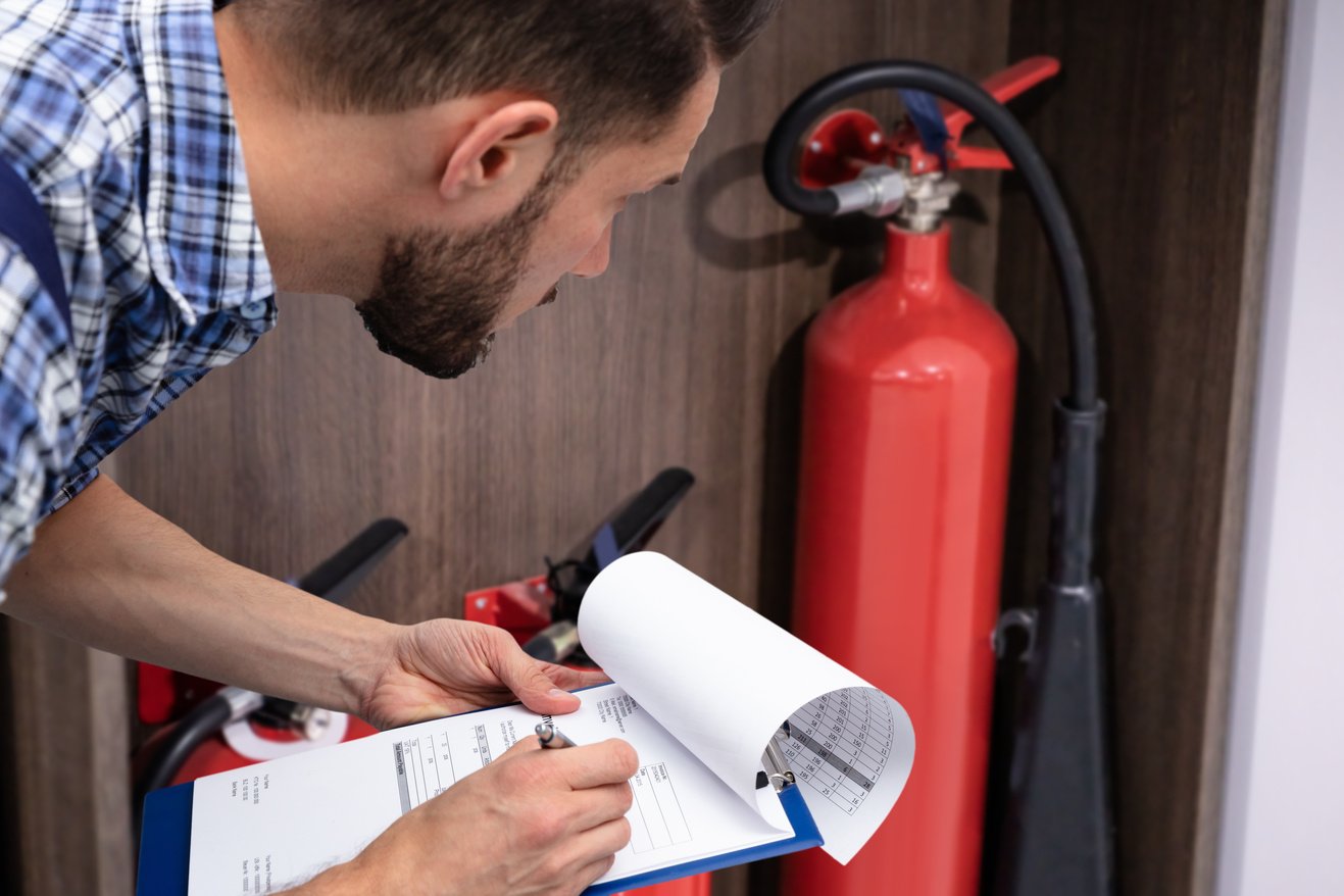 Checking Fire Extinguisher. Safety